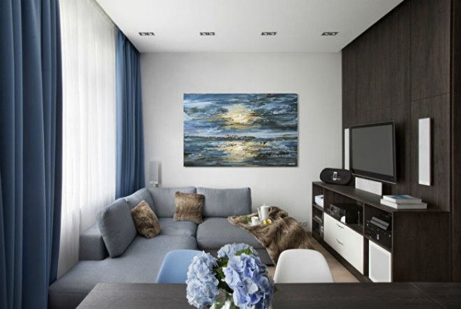 Спокойная гостиная с элементами морского стиля Фото Trizioru