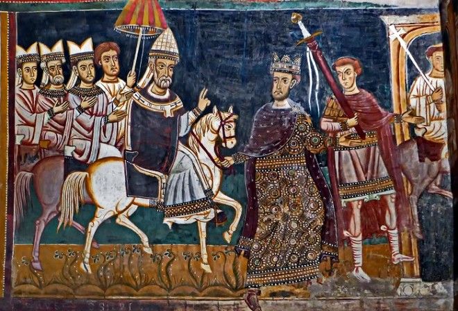 Константин I ведёт под уздцы коня на котором восседает папа Сильвестр I Фреска капеллы СанСильвестро до 1247 года Фото ruwikipediaorg