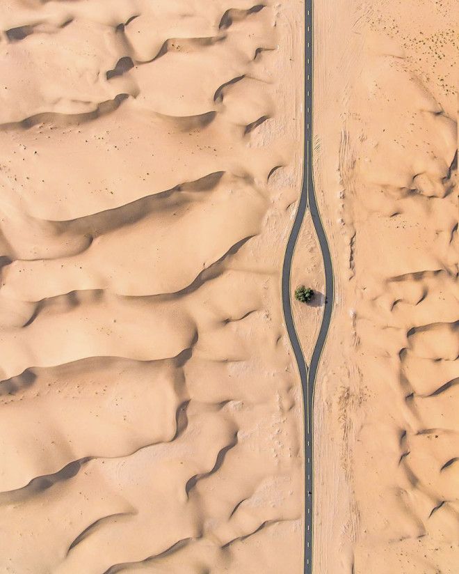 Фотограф заснял с дрона, как пустыня пожирает Дубай и Абу-Даби 35