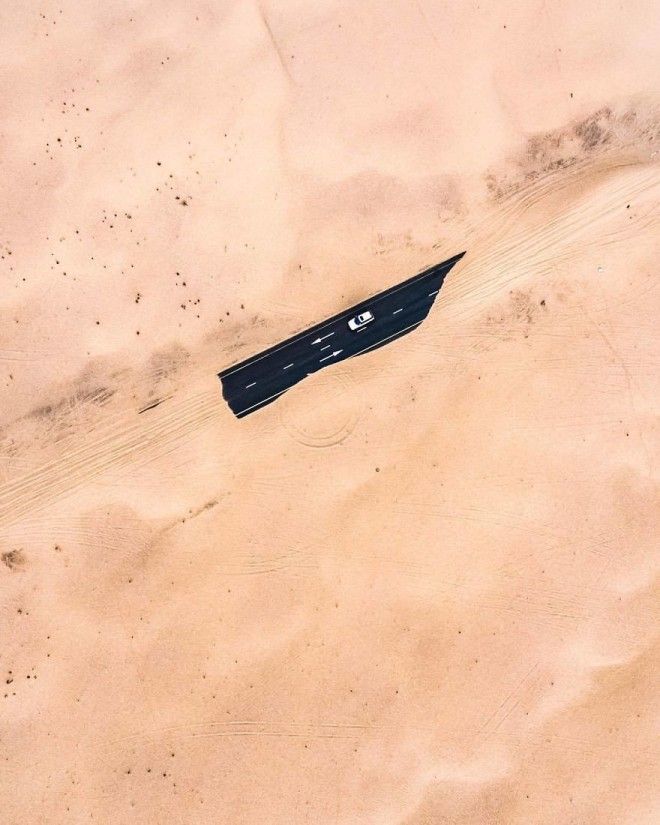 Фотограф заснял с дрона, как пустыня пожирает Дубай и Абу-Даби 33